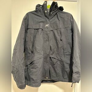 Helly Hansen Charcoal Gray Hooded Breathable Packable Windbreaker Rain Coat.
